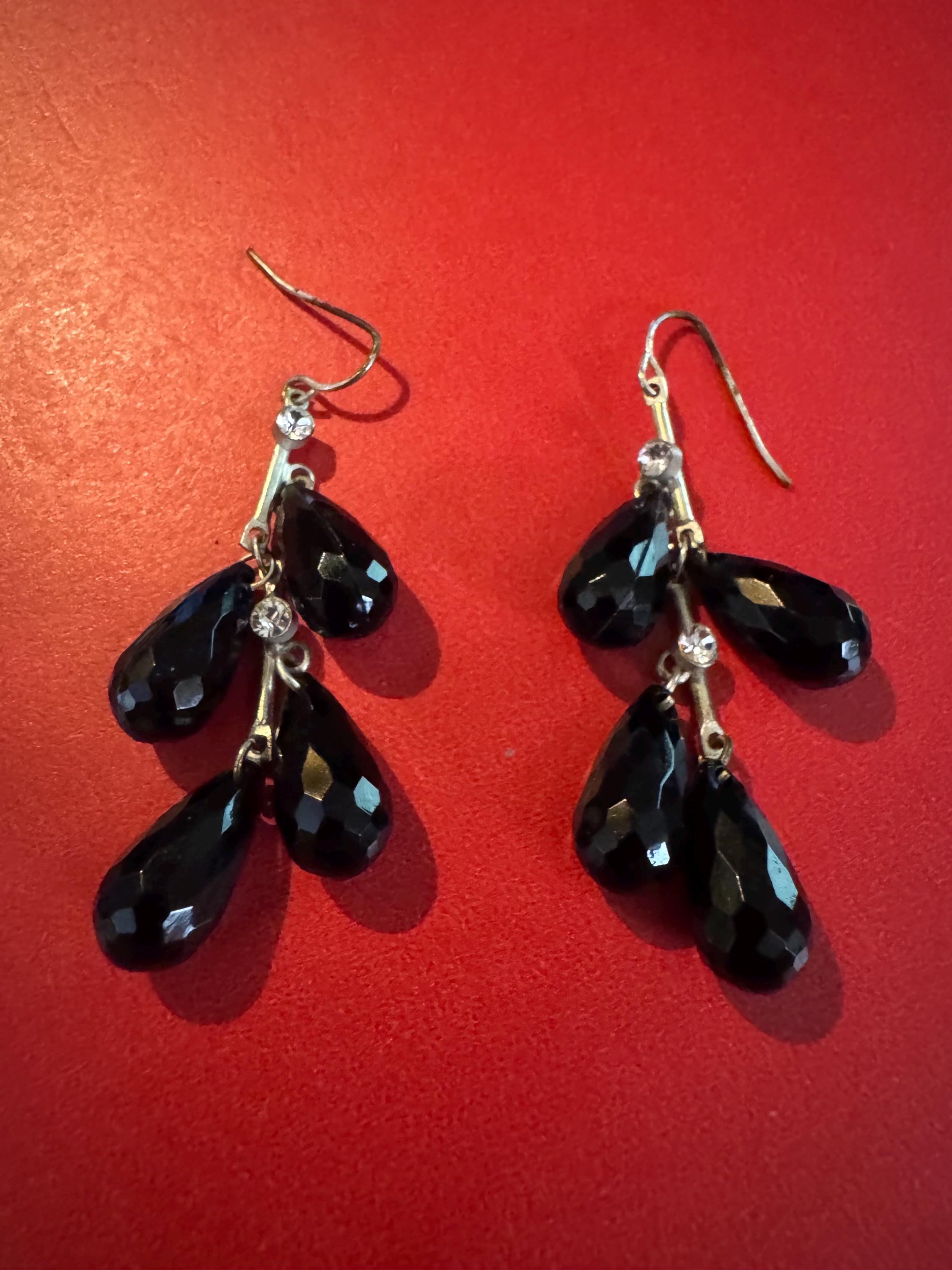 Black Crystal and Silver toned hook earrings.