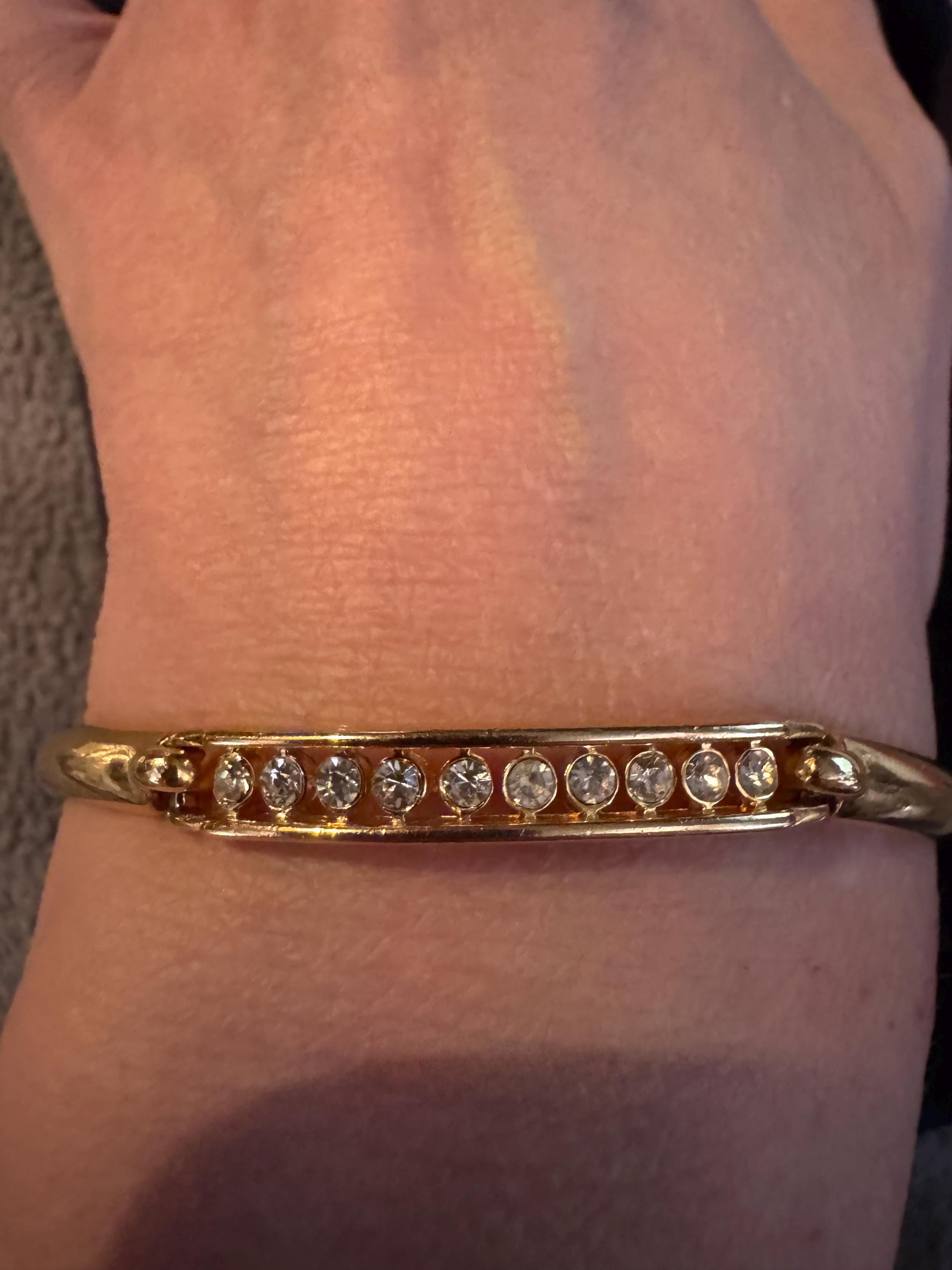 Beautiful Faux Half Tennis Bracelet, SP and hinged.