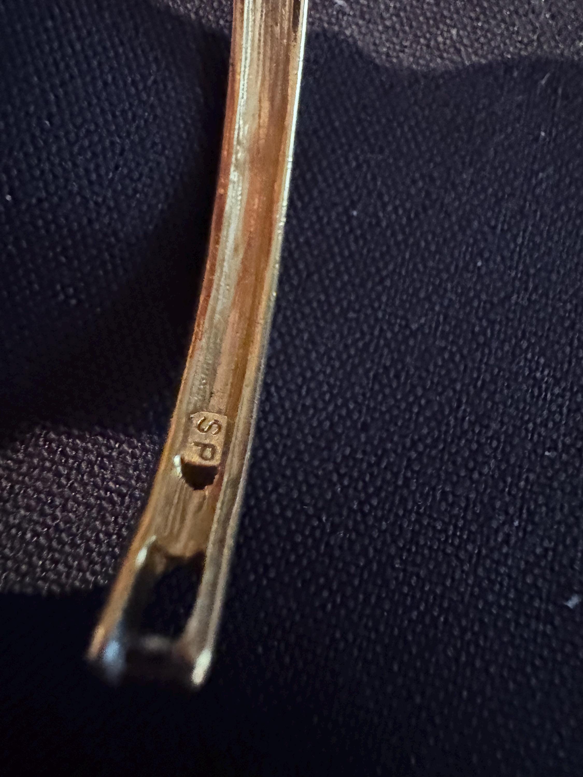 Beautiful Faux Half Tennis Bracelet, SP and hinged.