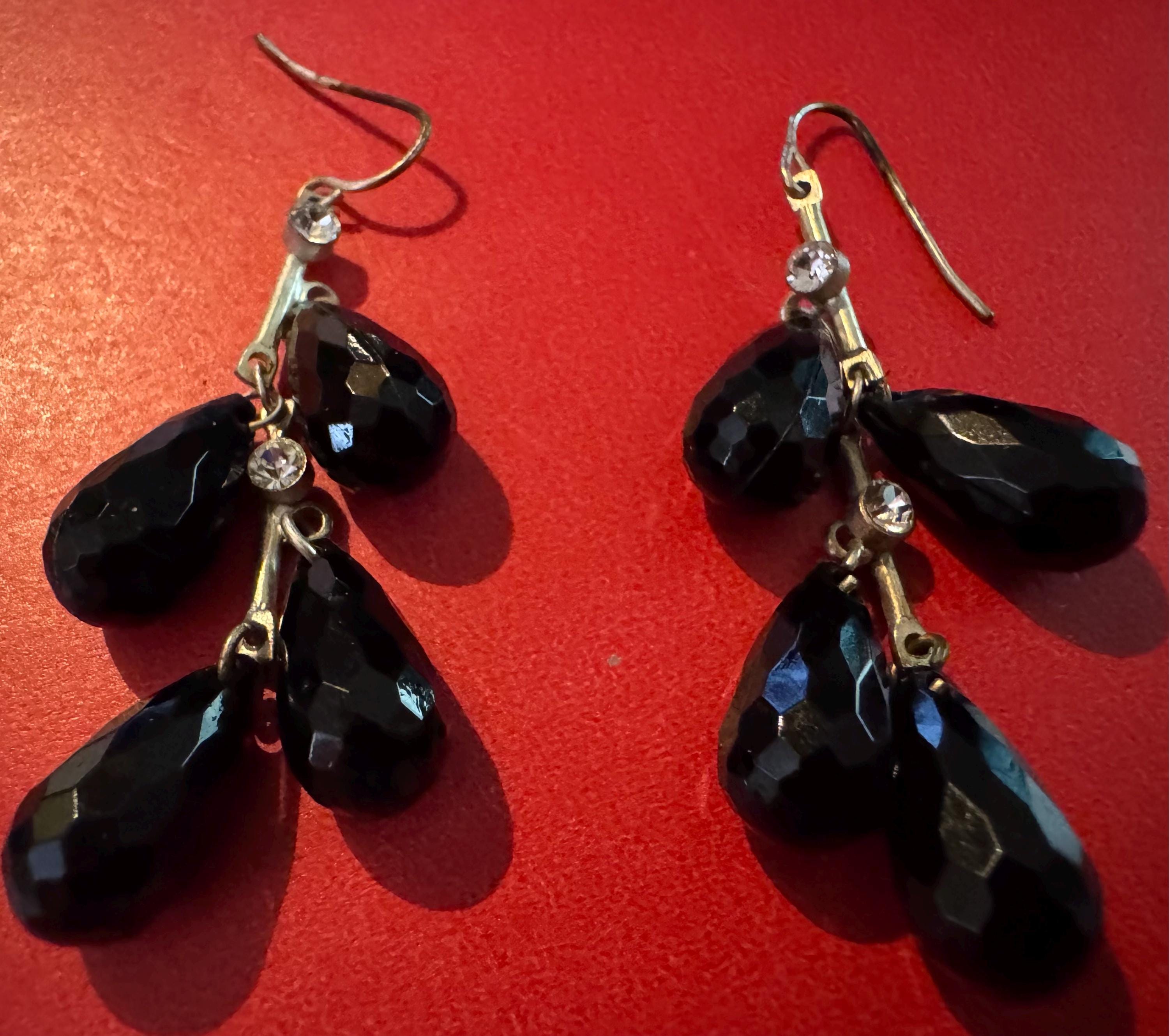 Black Crystal and Silver toned hook earrings.