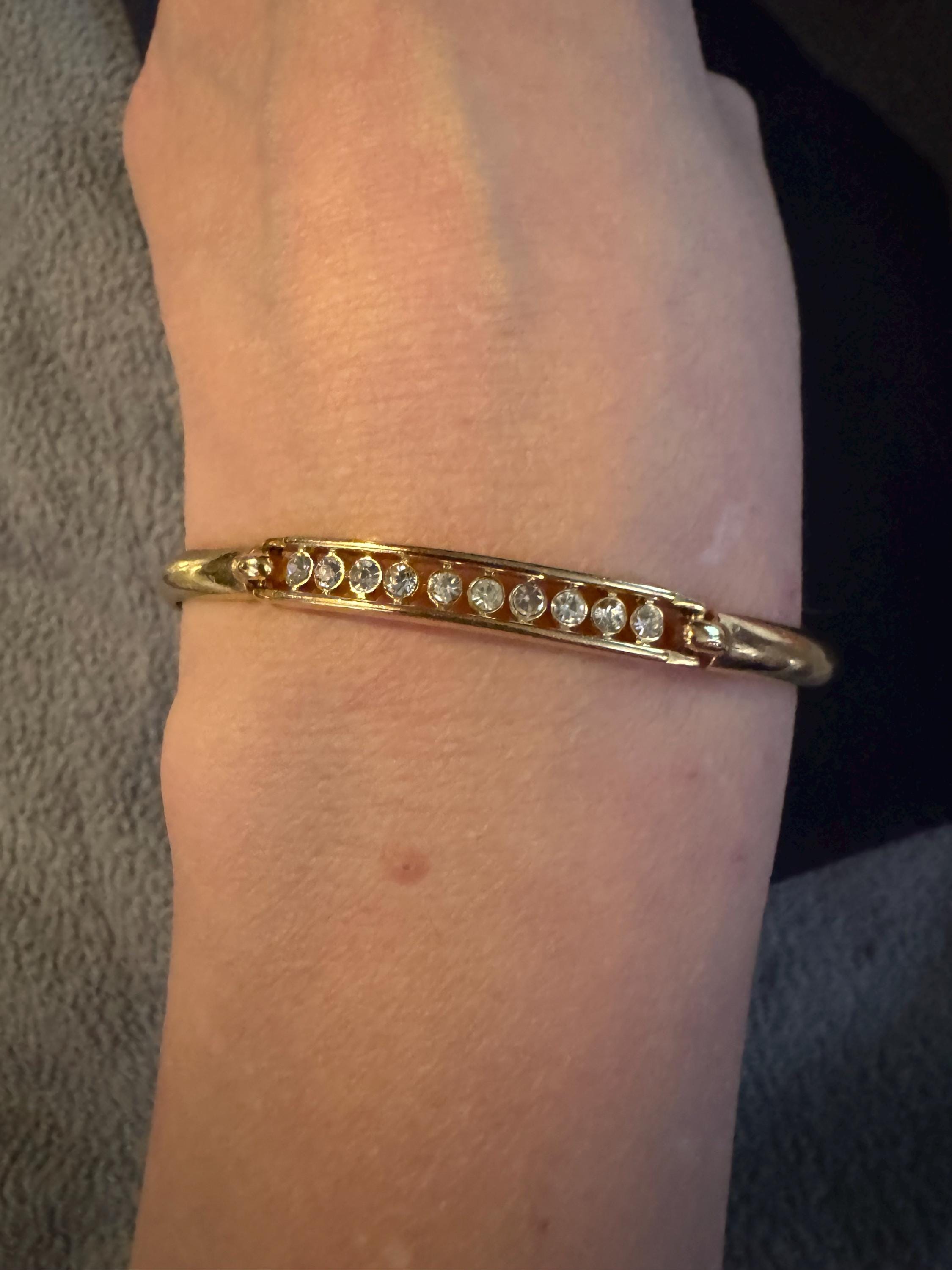 Beautiful Faux Half Tennis Bracelet, SP and hinged.